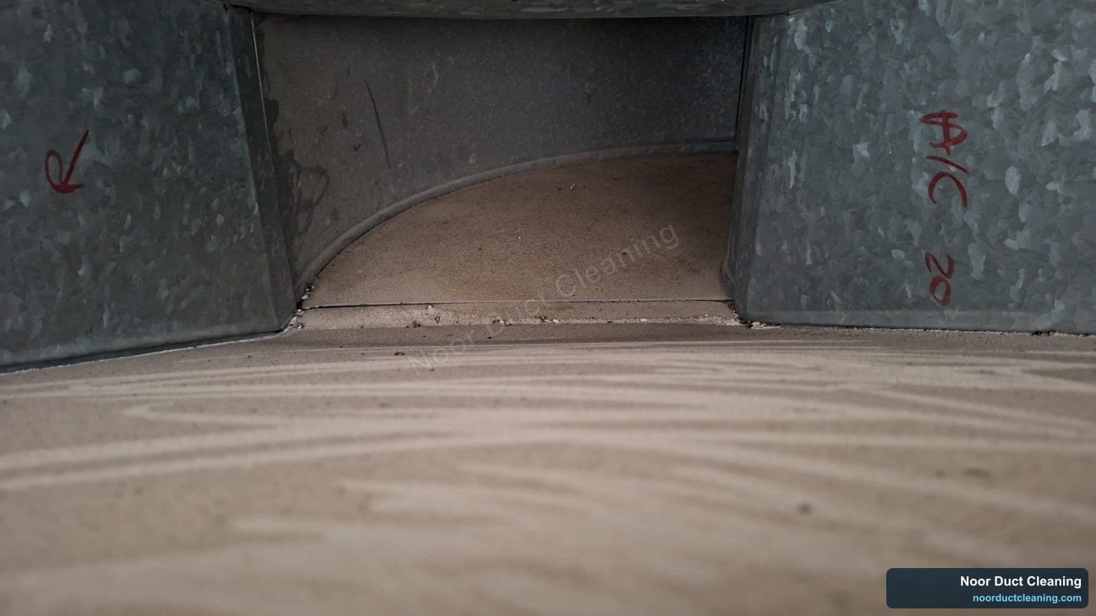AC duct take-off in a Dubai home before and after cleaning, a dust drift across the full width of the duct extracted